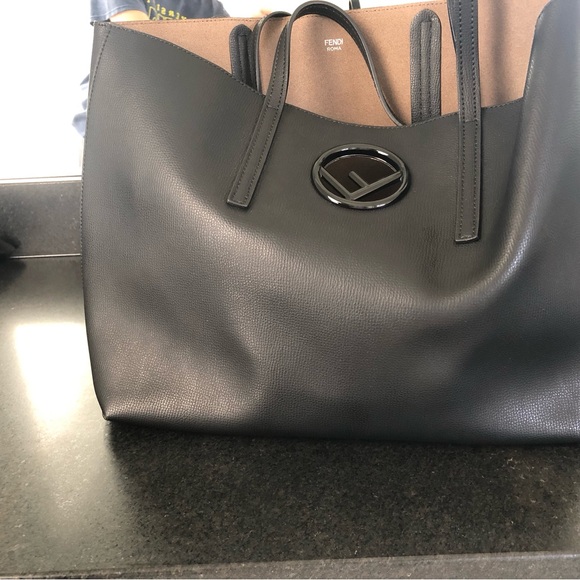 Black Fendi tote! Such a cute travel bag, but not bulky. Super trendy! - Picture 2 of 15